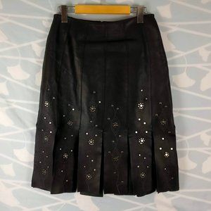 350$ new with tags Black Leather Skirt with studded medallions, Midi Skirt sz. 6